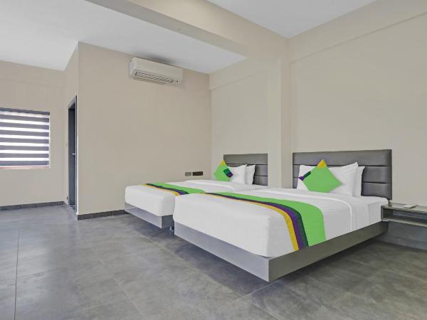 Treebo Grand Vistara Airport Suites : photo 6 de la chambre chambre double supérieure