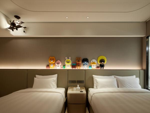 Lotte Hotel World : photo 2 de la chambre chambre lits jumeaux familiale caractère kakao