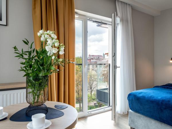 InPoint Apartments G13 near Old Town & Kazimierz : photo 2 de la chambre appartement avec balcon