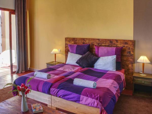 Terrasses vertes : photo 2 de la chambre suite lit king-size - vue sur piscine