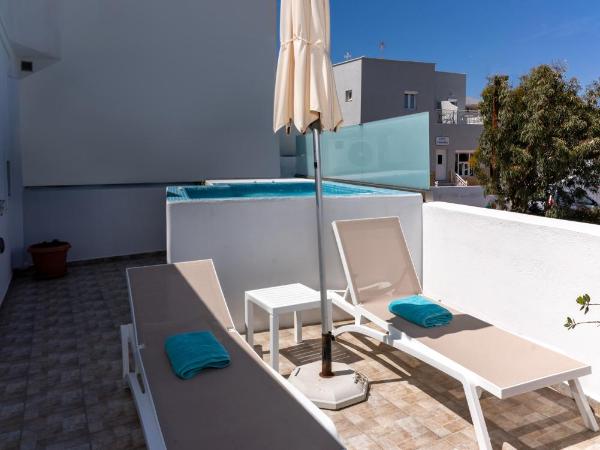 Anamnesis City Spa : photo 4 de la chambre chambre triple de luxe avec bain à remous