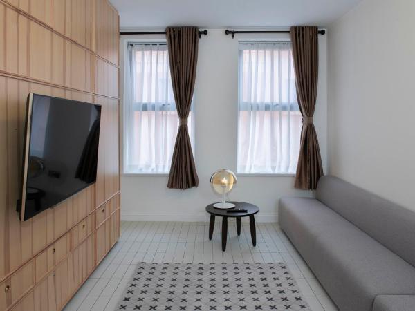 Trueman Court Luxury Serviced Apartments : photo 6 de la chambre studio supérieur