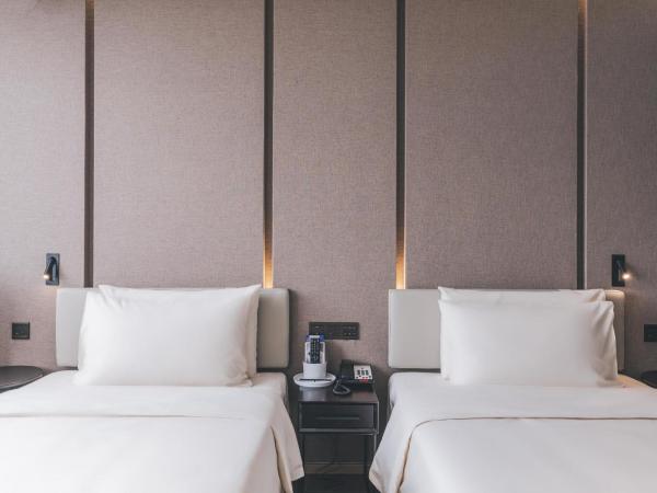 Atour Hotel Ningbo Jishi Harbor Outlets : photo 1 de la chambre chambre lits jumeaux Élégante