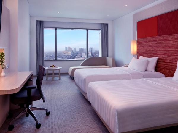 Grand Mercure Jakarta Harmoni : photo 3 de la chambre chambre lits jumeaux deluxe