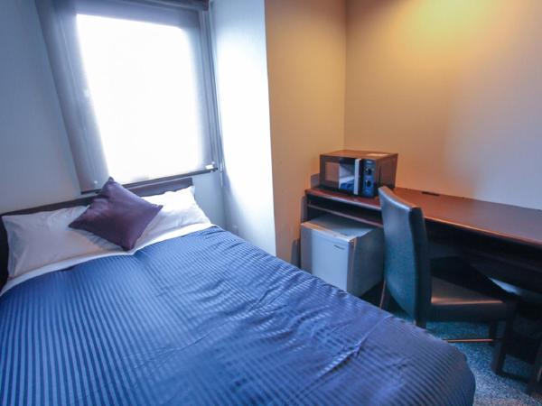 HOTEL LiVEMAX Kobe Sannomiya : photo 2 de la chambre chambre double avec petit lit double - fumeurs