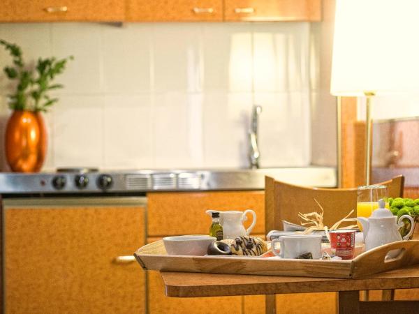 Acacia Suite : photo 5 de la chambre appartement avec kitchenette