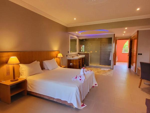 La Maison Des Oliviers : photo 1 de la chambre chambre double deluxe - vue sur jardin