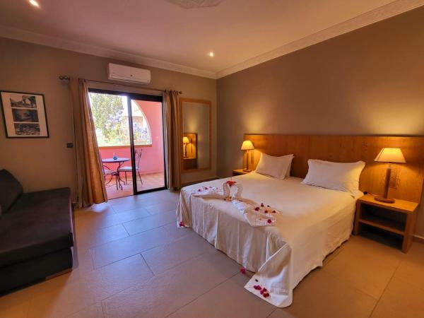 La Maison Des Oliviers : photo 2 de la chambre chambre double deluxe - vue sur jardin