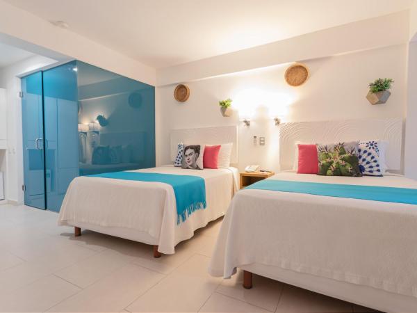 Mia Reef Isla Mujeres Cancun All Inclusive Resort : photo 2 de la chambre chambre deluxe - vue sur océan