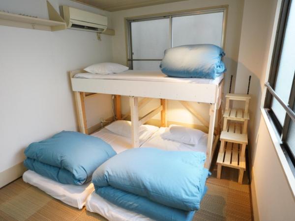 Guest House Shinagawa-shuku : photo 9 de la chambre chambre triple Économique avec salle de bains commune