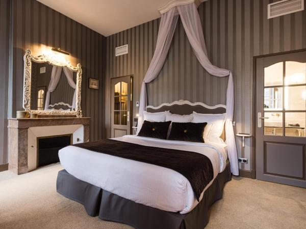 LE PETIT MANOIR : photo 1 de la chambre chambre double supérieure - vue sur cour