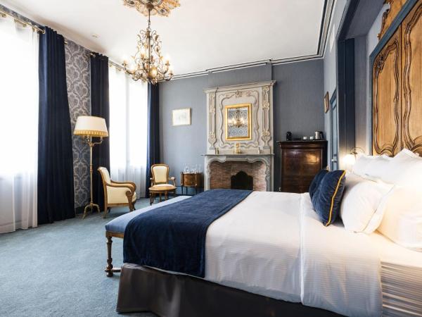 LE PETIT MANOIR : photo 2 de la chambre chambre double deluxe - vue sur cour