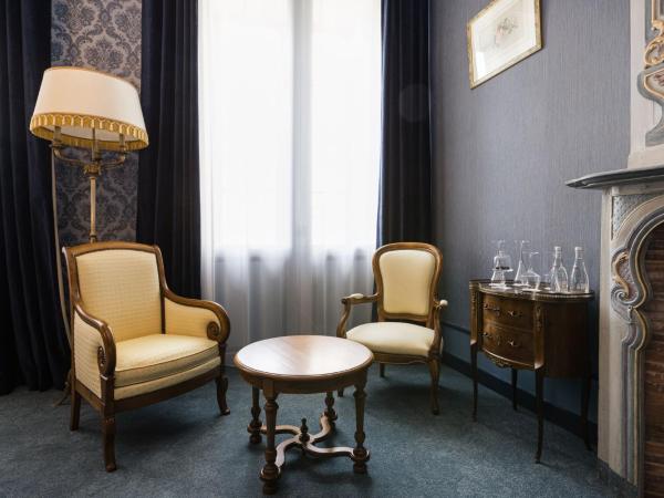 LE PETIT MANOIR : photo 3 de la chambre chambre double deluxe - vue sur cour