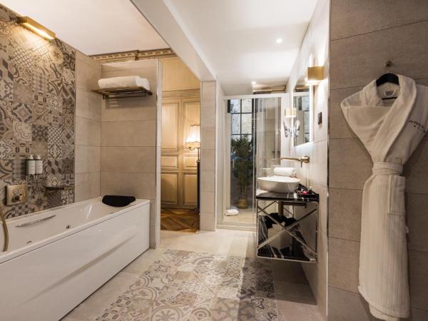 LE PETIT MANOIR : photo 4 de la chambre suite deluxe avec terrasse