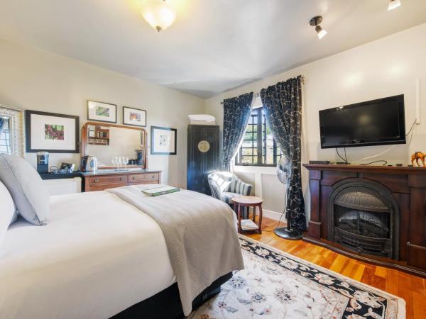 The Ivy on Parker Guest House : photo 1 de la chambre chambre lit queen-size - vue sur jardin