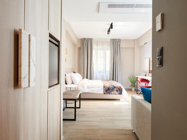 The Mavili urban stay : photo 5 de la chambre chambre triple confort