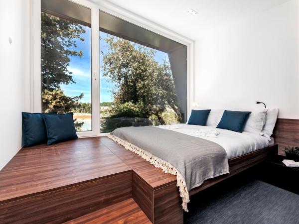 Porton Nature Hideouts : photo 8 de la chambre maison de vacances familiale 2 modules avec piscine