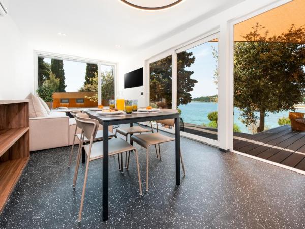 Porton Nature Hideouts : photo 4 de la chambre maison de vacances familiale 2 modules avec piscine