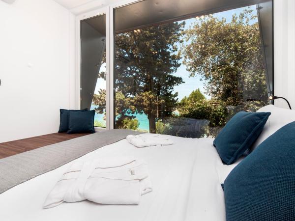 Porton Nature Hideouts : photo 5 de la chambre maison de vacances familiale 2 modules avec piscine