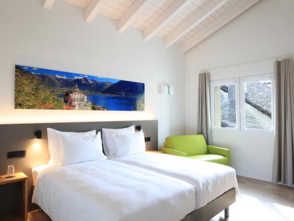 Charme Hotel al Torchio : photo 2 de la chambre chambre familiale triple moderne