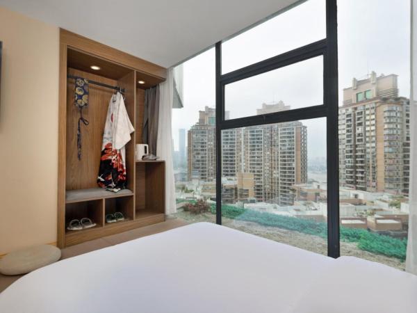 吃山文化青年旅店 : photo 2 de la chambre chambre double avec lit d'appoint