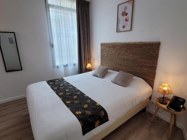 Le Relais du Valois Cognac Centre : photo 1 de la chambre chambre triple classique