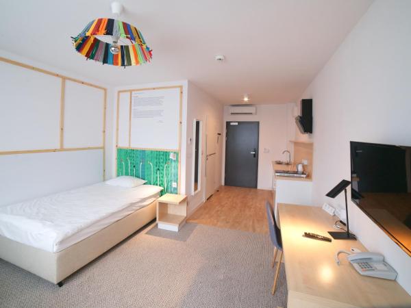 Arche Hotel Poloneza : photo 10 de la chambre grande chambre simple 