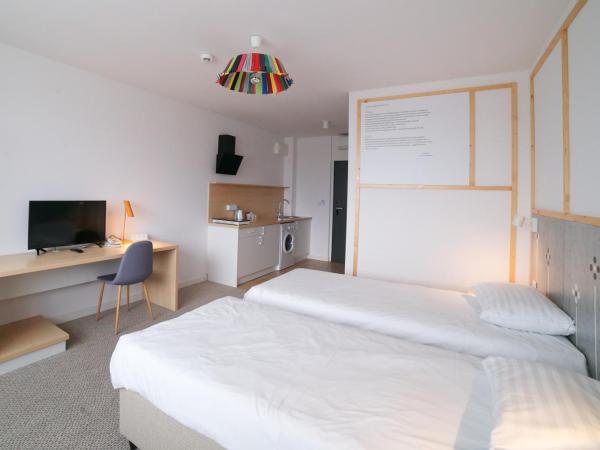 Arche Hotel Poloneza : photo 6 de la chambre grande chambre simple 