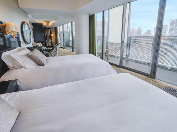 Harmonie Embrassee : photo 3 de la chambre chambre lits jumeaux supérieure - non-fumeurs