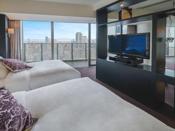 Harmonie Embrassee : photo 4 de la chambre chambre lits jumeaux de luxe - non-fumeurs