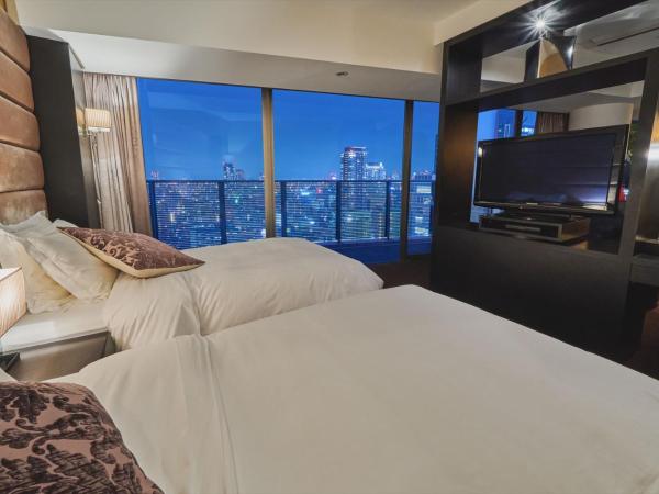 Harmonie Embrassee : photo 5 de la chambre chambre lits jumeaux de luxe - non-fumeurs