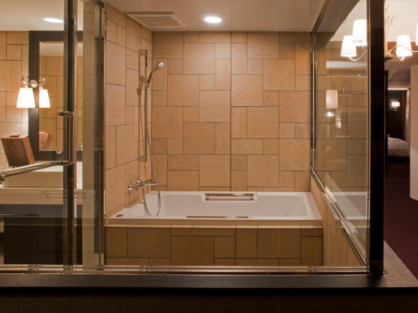 Harmonie Embrassee : photo 7 de la chambre chambre lits jumeaux de luxe - non-fumeurs