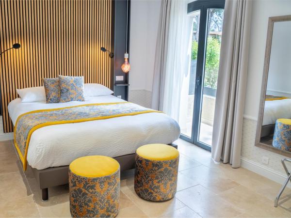 Le Confidentiel Hôtel & SPA : photo 3 de la chambre hébergement double confortable avec terrasse 