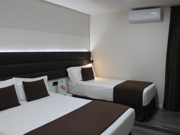 BCN Urbaness Hotels Del Comte : photo 1 de la chambre chambre double avec lit d'appoint