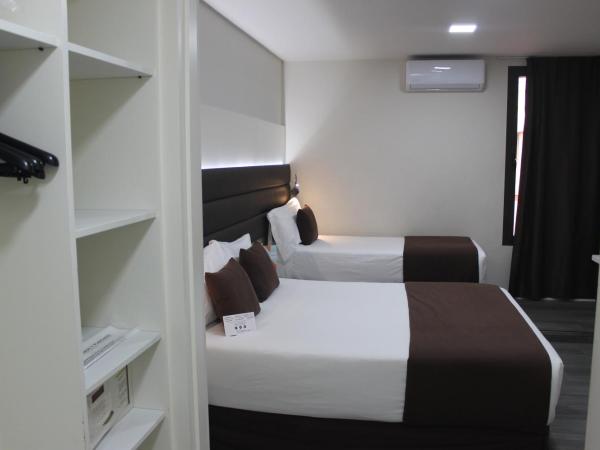 BCN Urbaness Hotels Del Comte : photo 3 de la chambre chambre double avec lit d'appoint