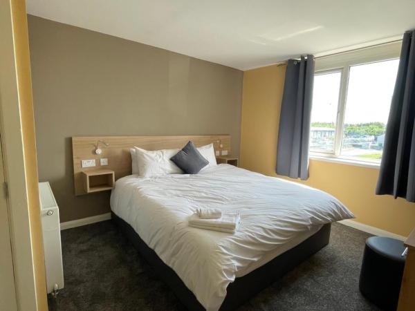Tinapa Suites : photo 2 de la chambre chambre lit king-size deluxe