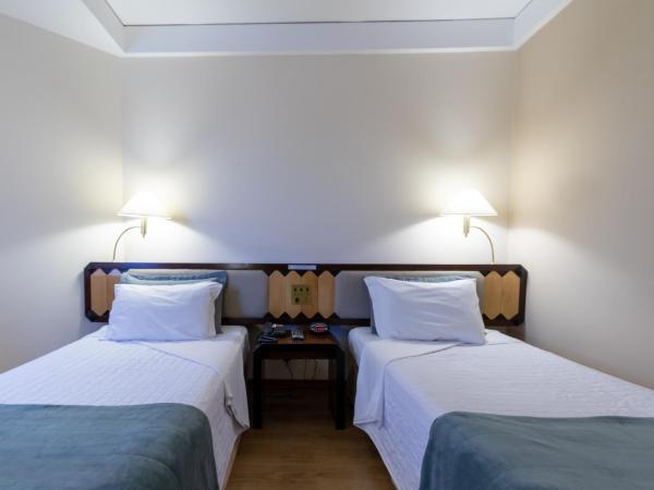 Golden Tower Pinheiros by Fênix Hotéis : photo 4 de la chambre chambre lits jumeaux pour personnes à mobilité réduite