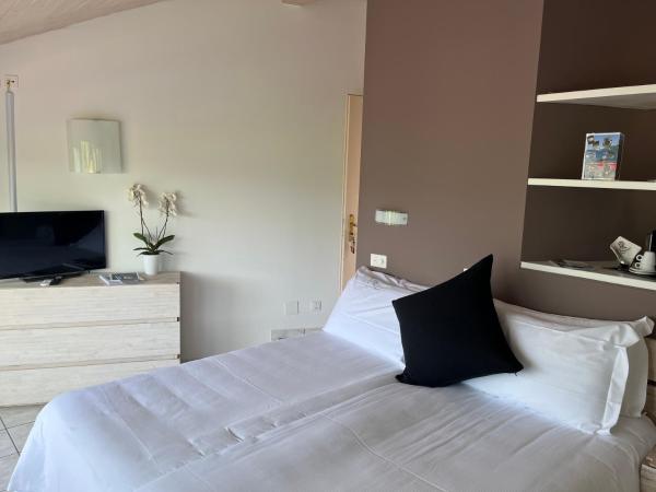 Garni degli Angioli : photo 3 de la chambre chambre lits jumeaux avec balcon et vue sur le lac