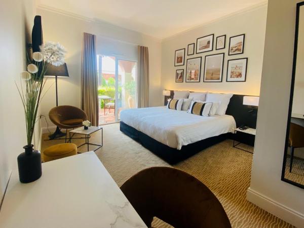 Palmyra Golf Hotel & Spa : photo 1 de la chambre chambre double confort avec terrasse - vue sur jardin - accès à la piscine chauffée - parking gratuit
