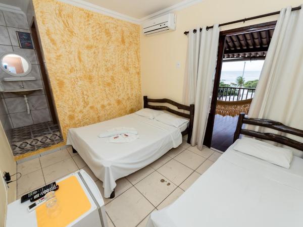 Pousada Terra do Sol Natal : photo 1 de la chambre chambre triple avec balcon