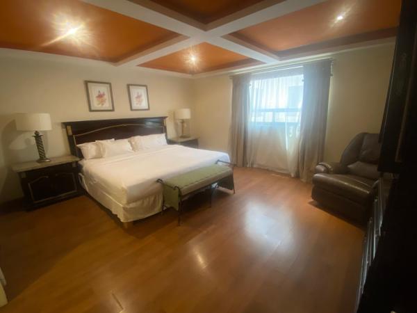 Rose Hotel : photo 2 de la chambre suite supérieure lit king-size