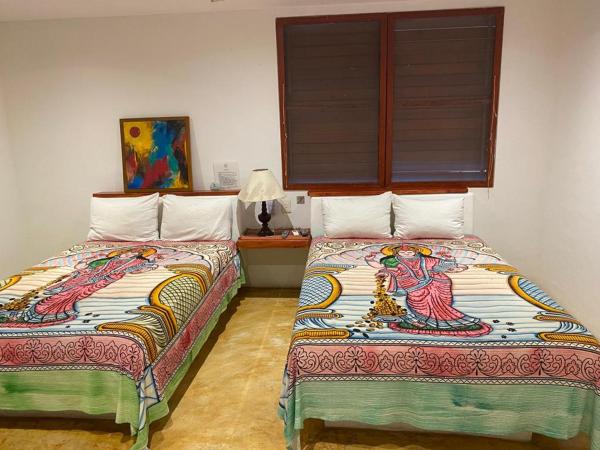 Casa de las Olas Surf & Beach Club : photo 10 de la chambre chambre lits jumeaux
