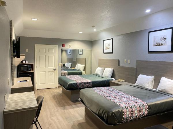Island Suites Hobby Airport : photo 1 de la chambre suite avec 2 lits queen-size