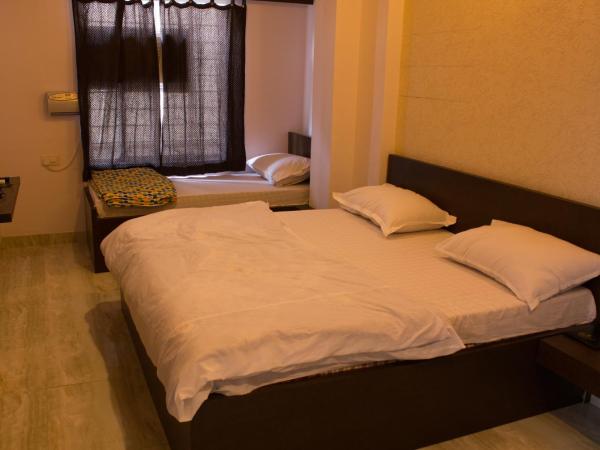 Hotel Holiday Home : photo 3 de la chambre chambre triple Économique