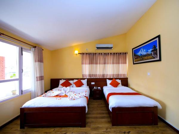 Sampada Garden Resort : photo 4 de la chambre chambre familiale deluxe