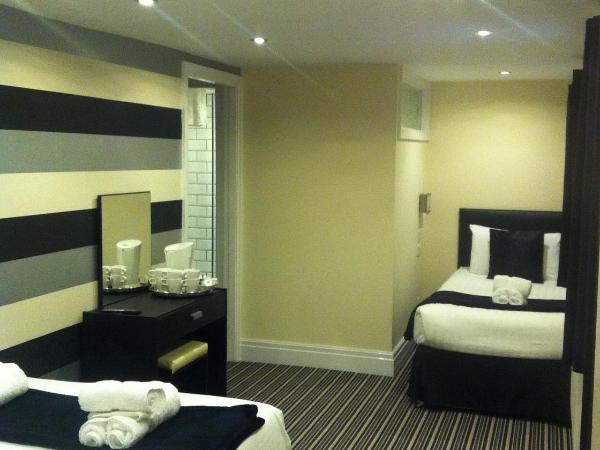 Happy Return Hotel : photo 4 de la chambre suite familiale