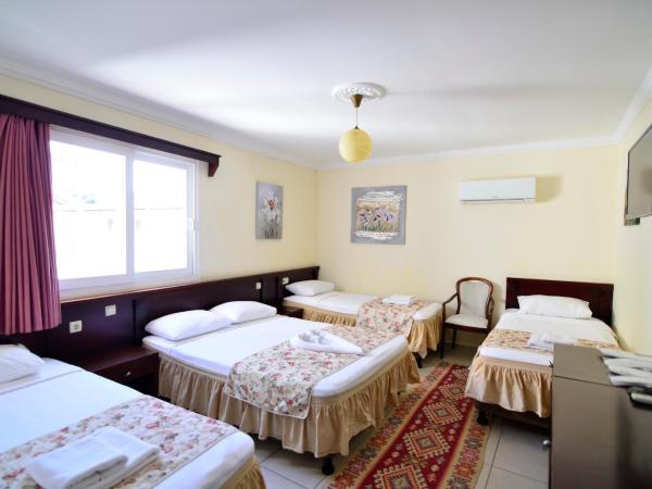 Sevin Hotel Pension : photo 2 de la chambre chambre quadruple standard