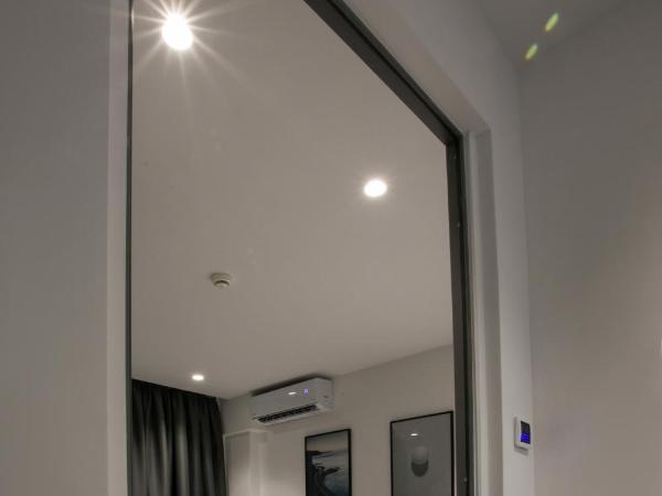 White Trilogy : photo 8 de la chambre chambre double ou lits jumeaux deluxe avec balcon