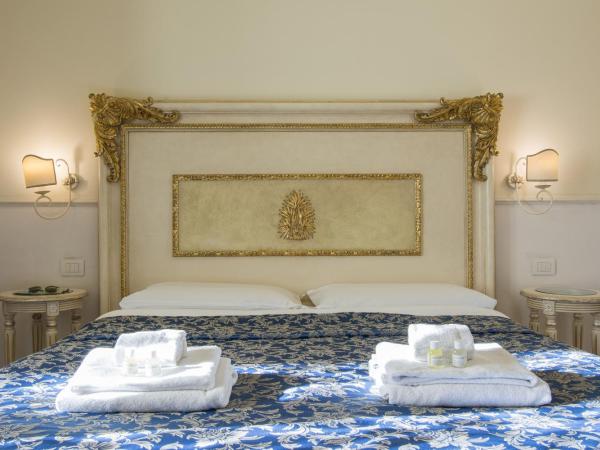 Relais Tiffany : photo 2 de la chambre chambre double ou lits jumeaux - vue sur jardin