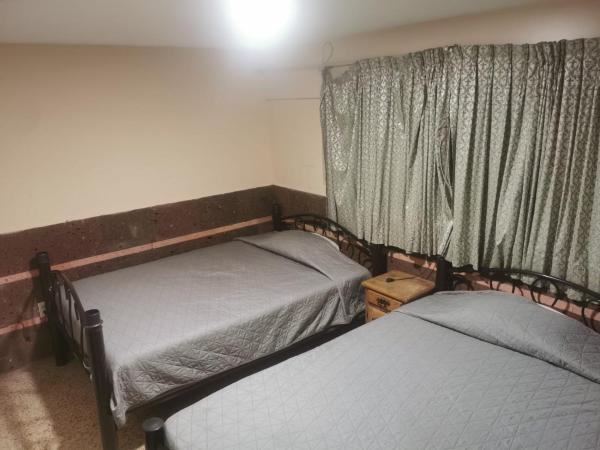 Margaritas Eco Haus : photo 6 de la chambre chambre quadruple avec salle de bains